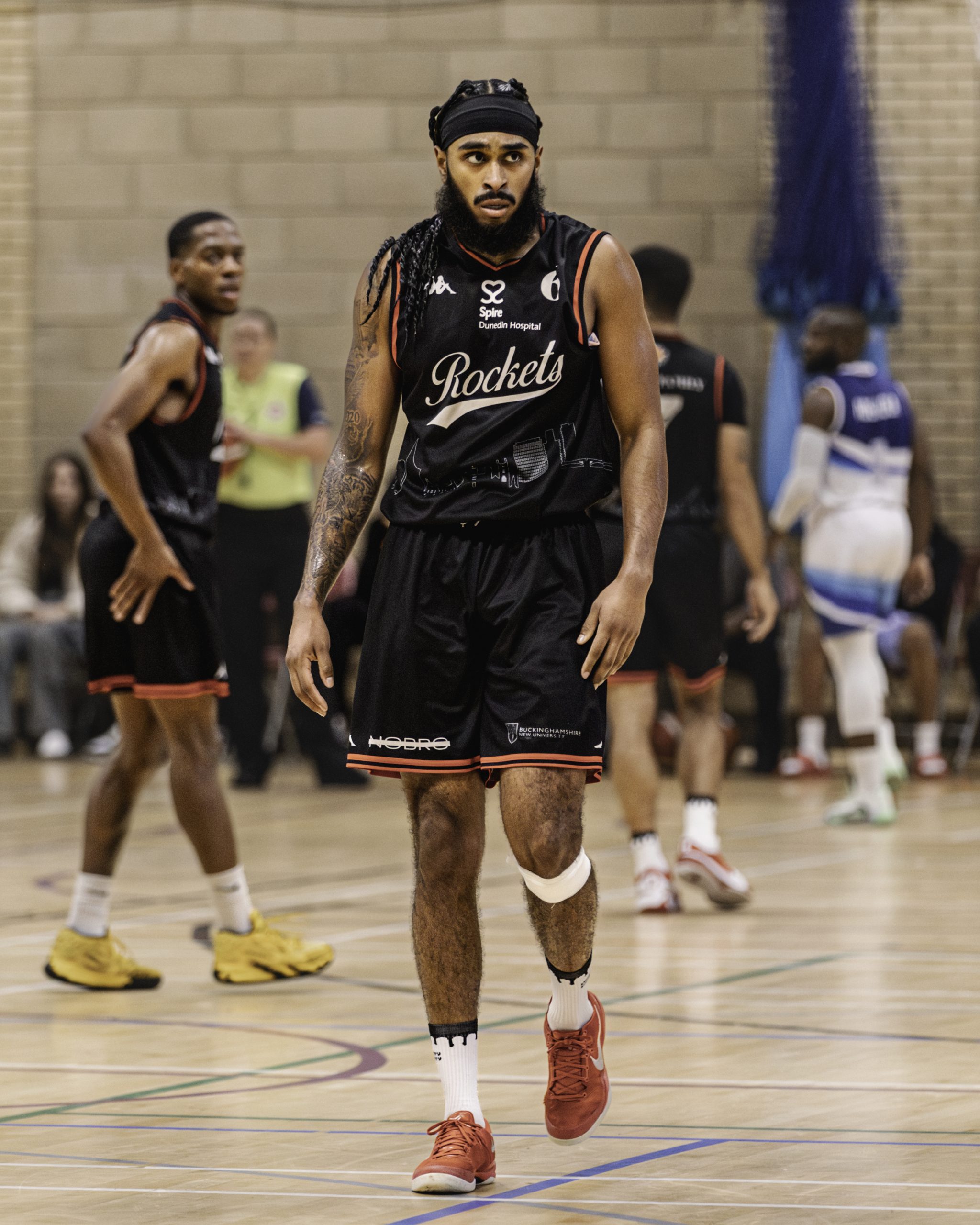 Picture of Zain Poorman with a basketball