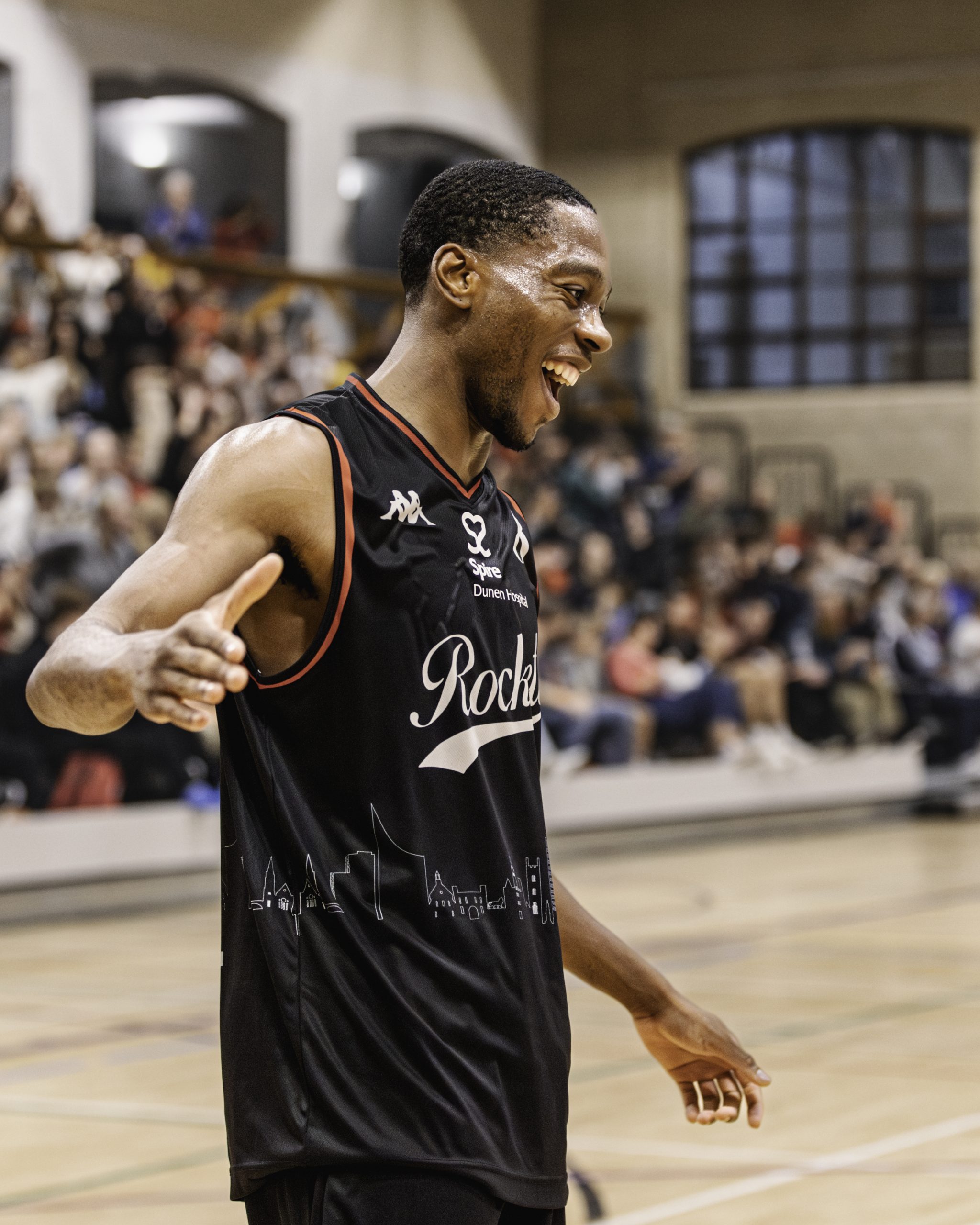 Picture of Victor Olarerin holding a basketball
