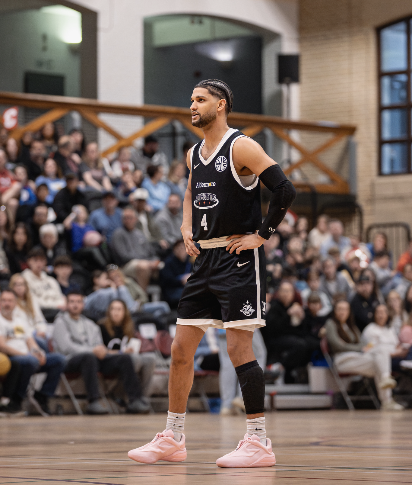 Picture of Mitch Clarke dribbling a basketball.
