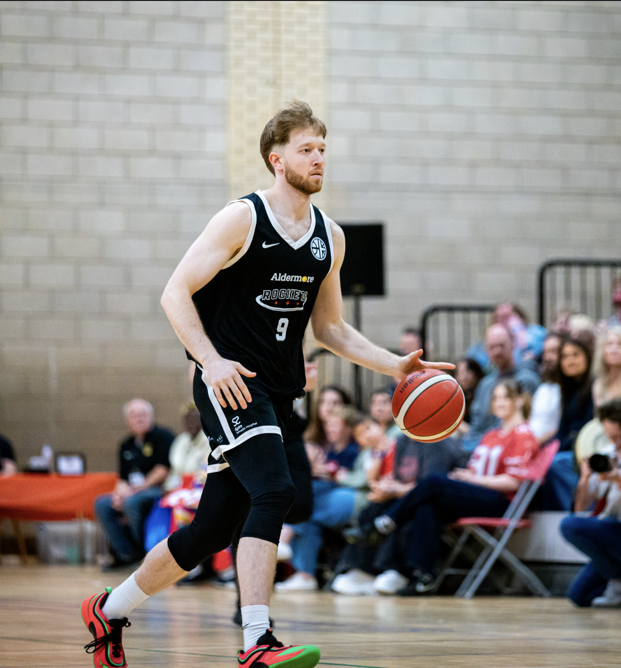 Picture of Isaac Spurrier holding a basketball