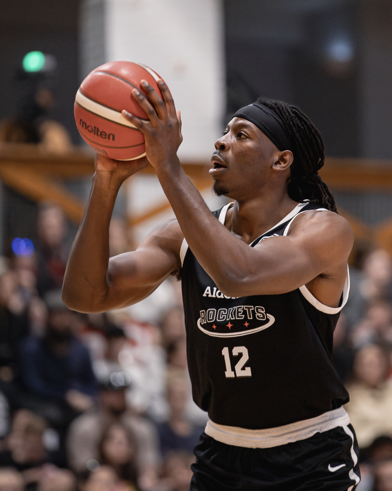 Picture of Simon Chamberlain holding a basketball