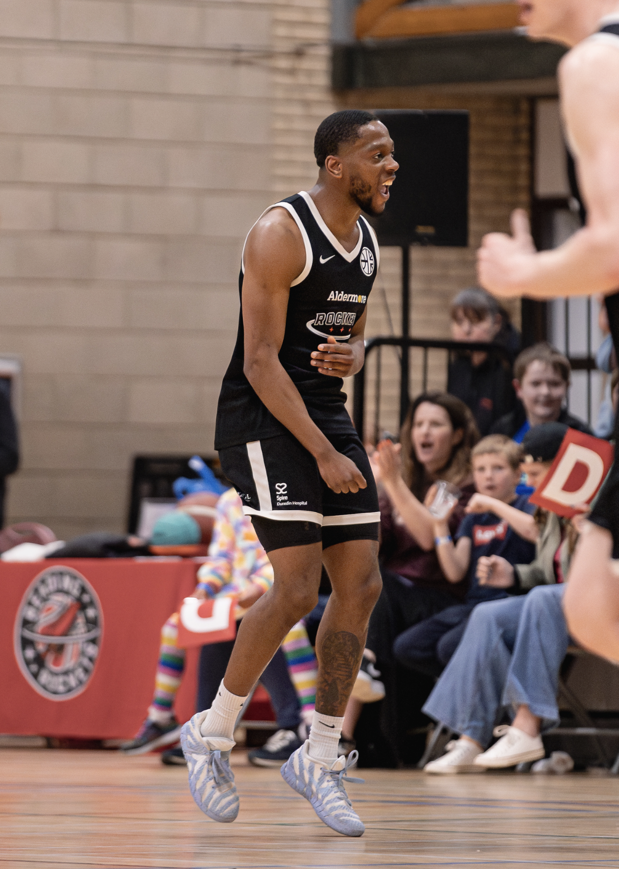 Picture of Victor Olarerin holding a basketball
