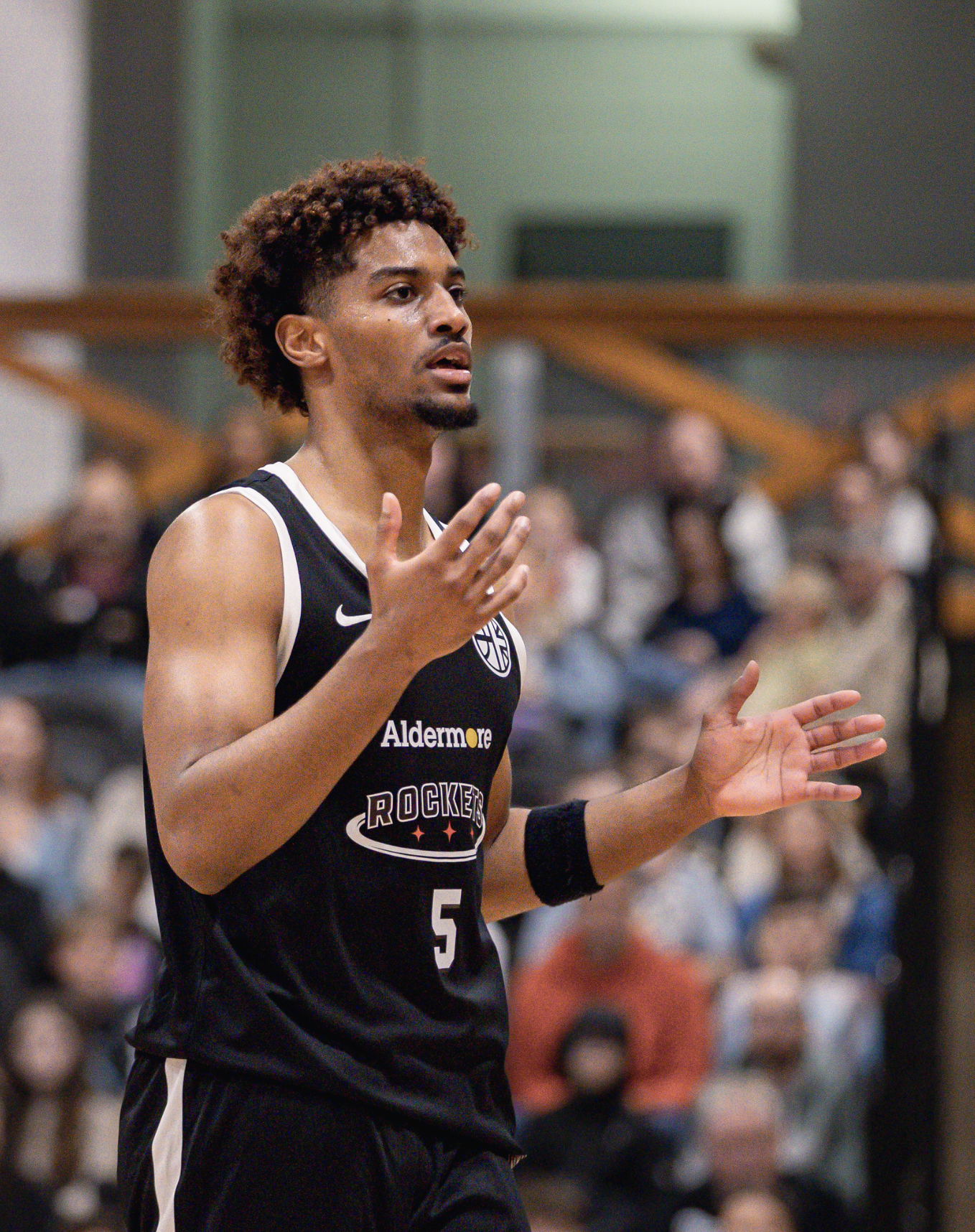 Picture of Reis Pinnock dribbling a basketball